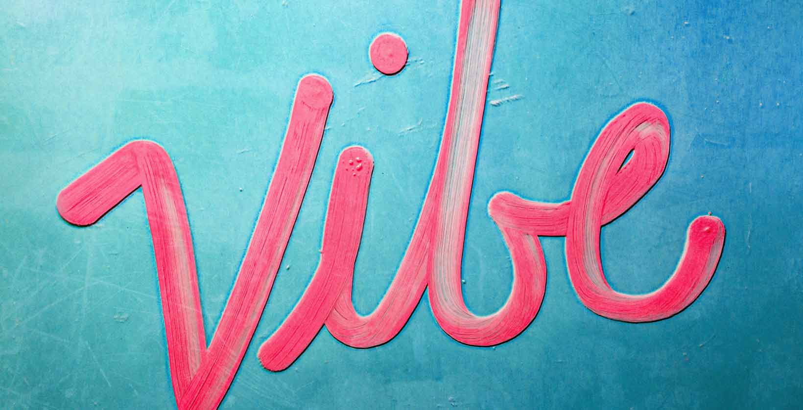 Painted cursive type that says Vibe